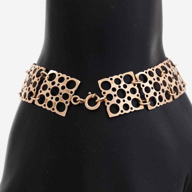 Liisa Vitali, Armband och örhängen "Pitsi", 14K guld. Westerback, Helsingfors 1969.