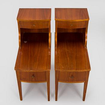 A pair of 20th century bedside tables.