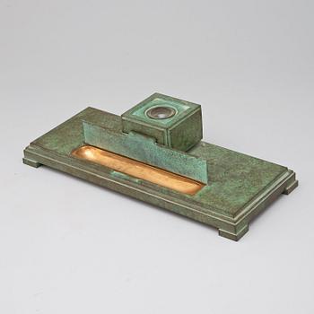 An Eric Hedland patinated bronze read set, Otto Meyer, 1920's-30's.