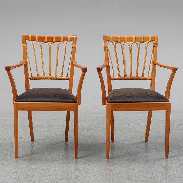 A pair of mahogany and rattan dining armchairs, Josef Frank, , model 1165, Svenskt Tenn, Stockholm.