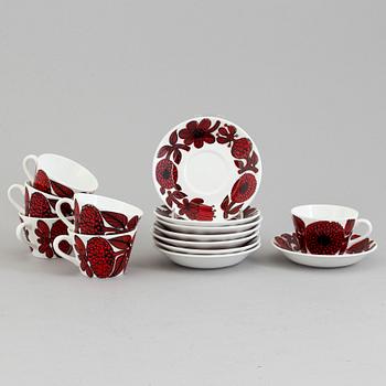 STIG LINDBERG, six bone china 'Röd Aster' coffee cups and saucers from Gustavsberg.