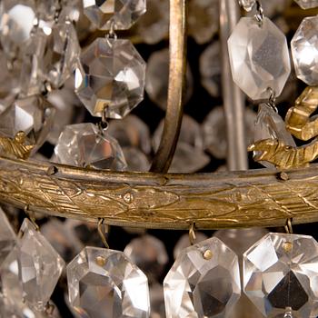An early 20th century cut glass chandelier.