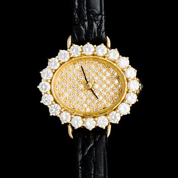 A LADIES´ WRISTWATCH, gold, brilliant cut and 8/8-cut diamonds, black leather stripe.