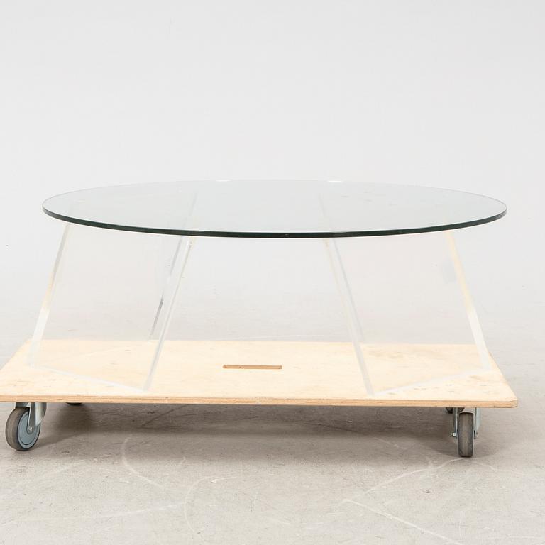 A late 20th century glass and plexi coffee table.
