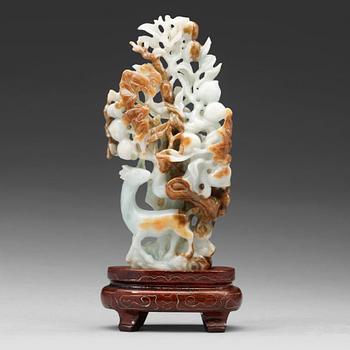 592. A Chinese nephrite sculpture, 20th Century.