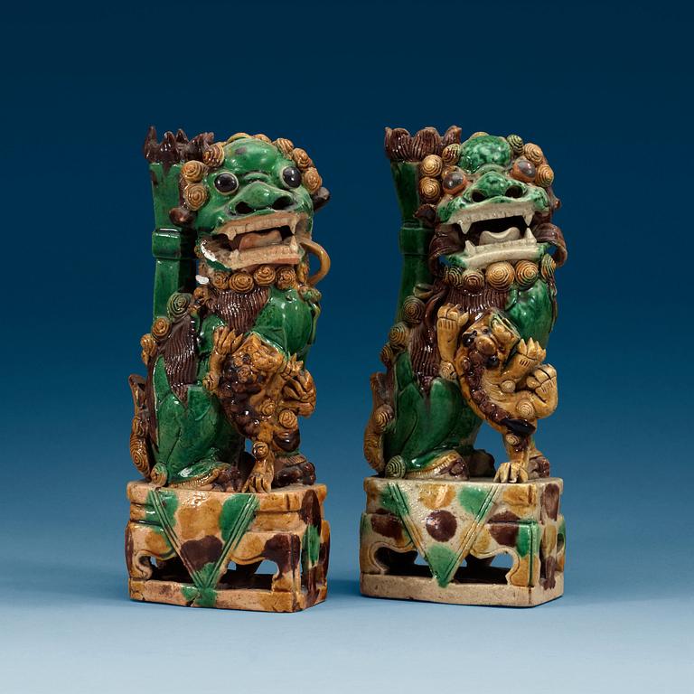 Two green, aubergine and yellow glazed bisquit joss stick holders, Qing dynasty, Kangxi (1662-1722).