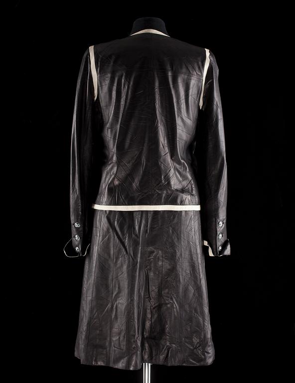 A black leather two-piece costume by Chanel from spring 2005.