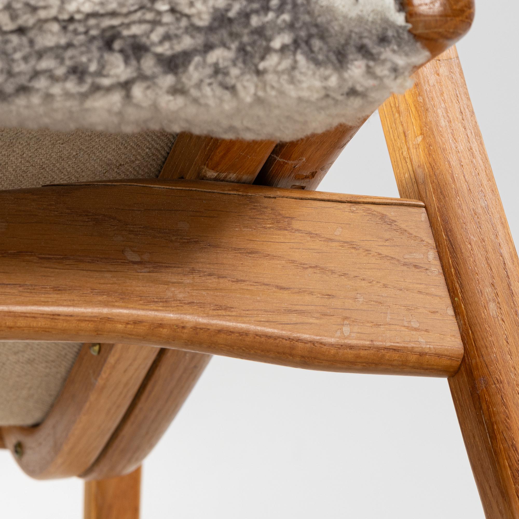 Yngve Ekström, an oak 'Lamino' easy chair with foot stool  for Swedese,
