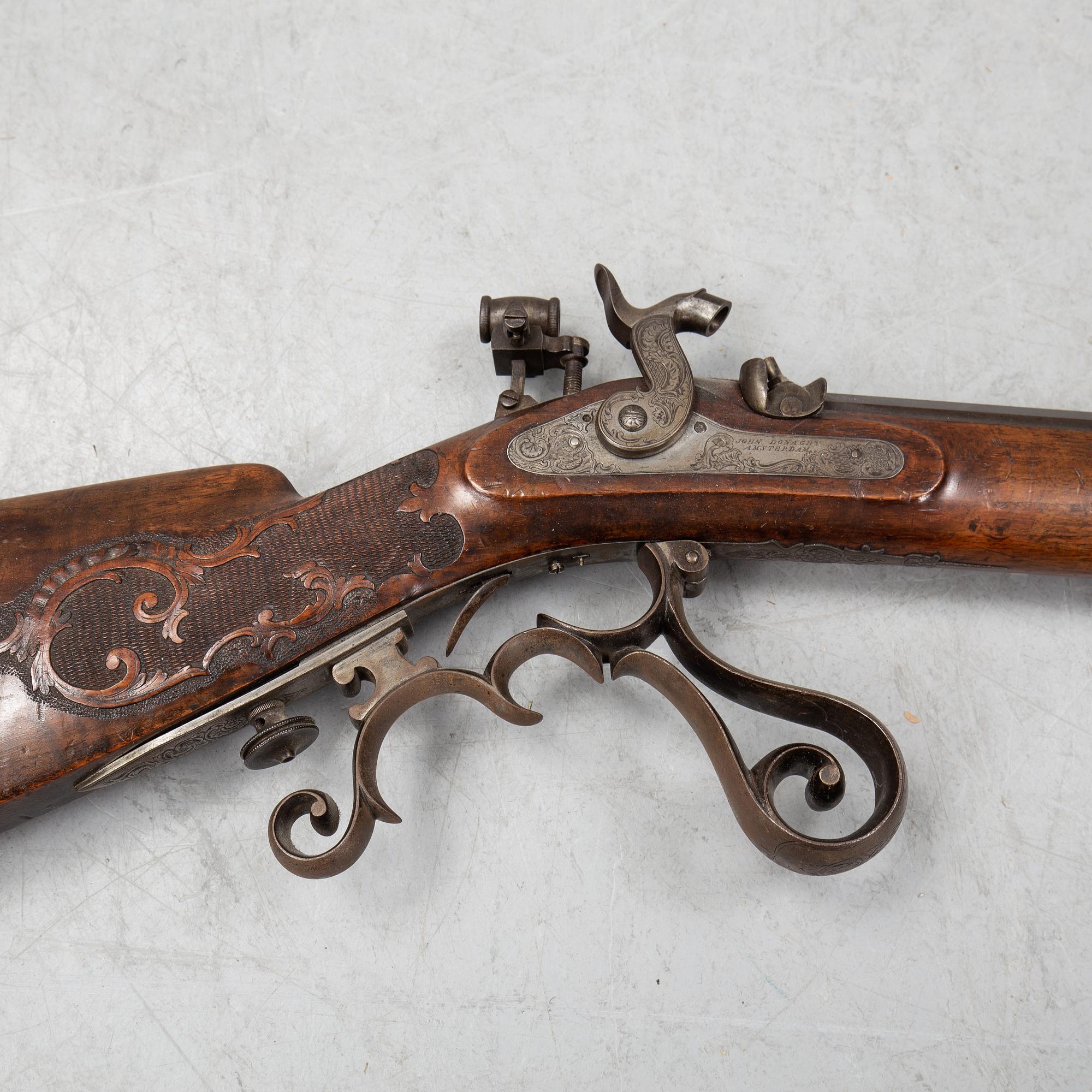 A pecussion rifle by John Donaghy, Amsterdam (1820-50).
