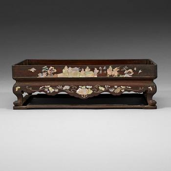 215. A wooden opium tray with inlays of mother-of-pearl, Qing dynasty, 19th Century.