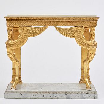 A late Gustavian giltwood console in the manner of J. Frisk, Stockholm, early 19th century.