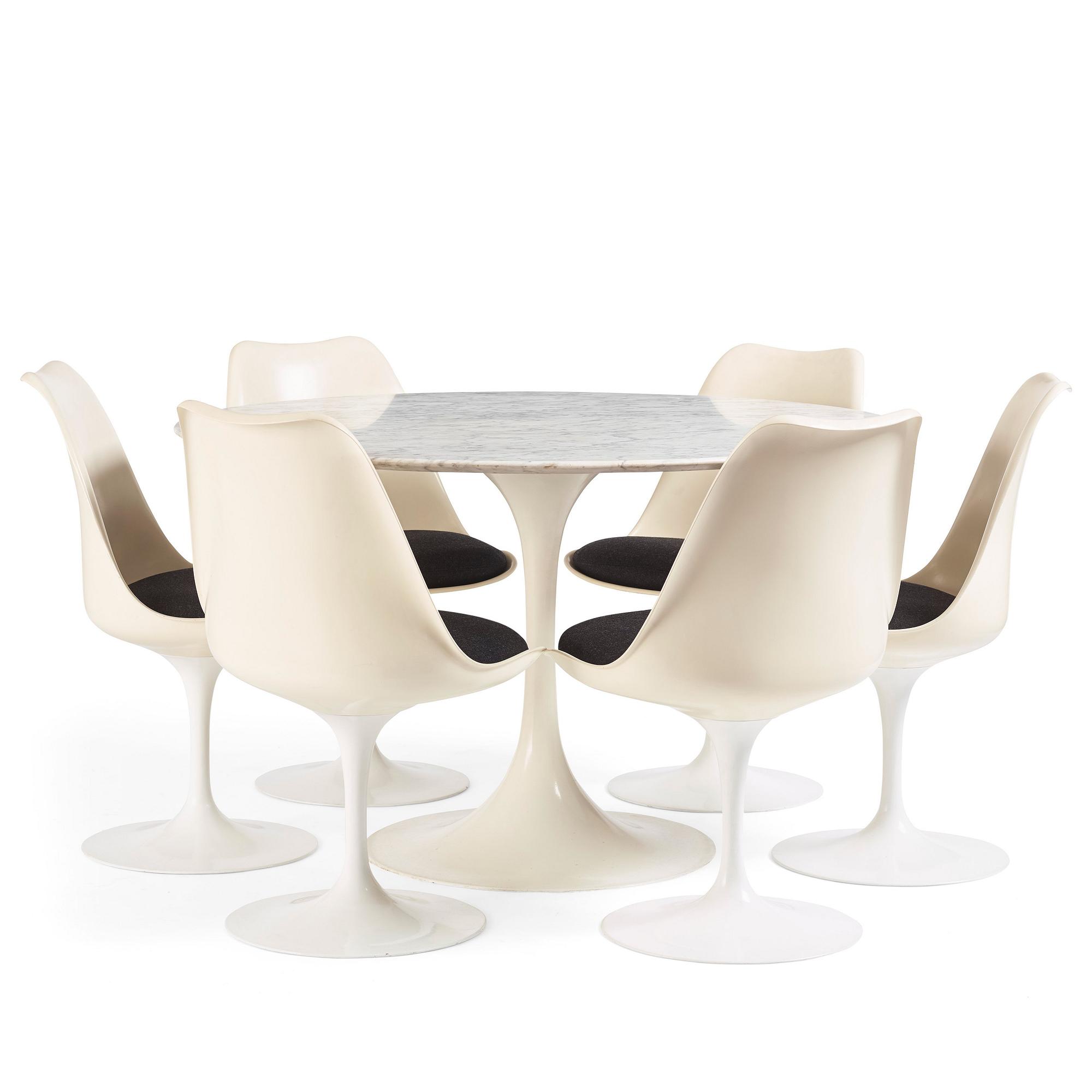 Eero Saarinen, a "Tulip", dining table and 6 chairs, Knoll International, 1960-70's.