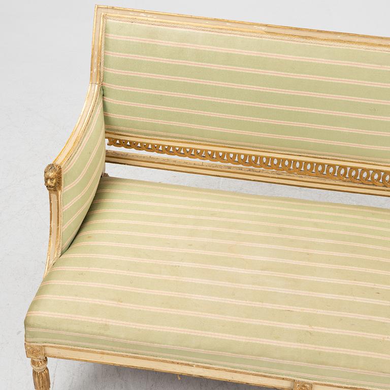 A late Gustaivan style sofa and four matched chairs from around the year 1900.