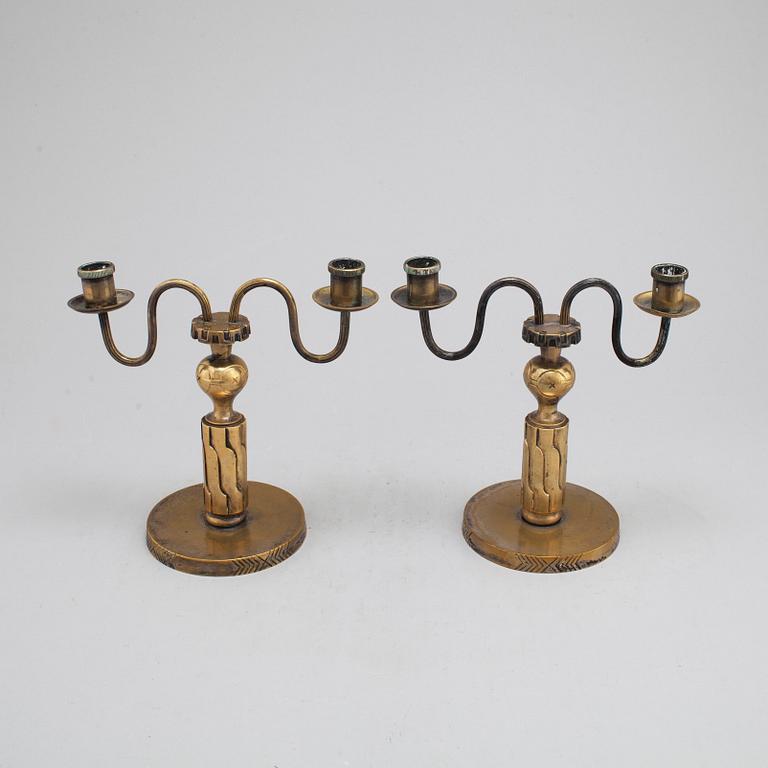 A pair of bronze candelabra, marked H. Bergman, 1920's/30's.