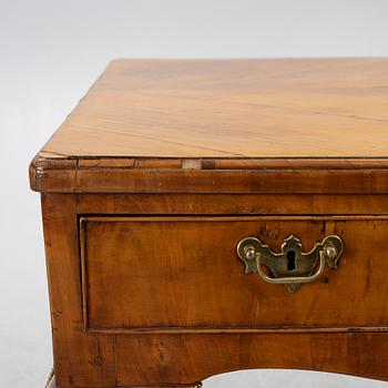 A George II walnut partner's desk, mid 18th century.