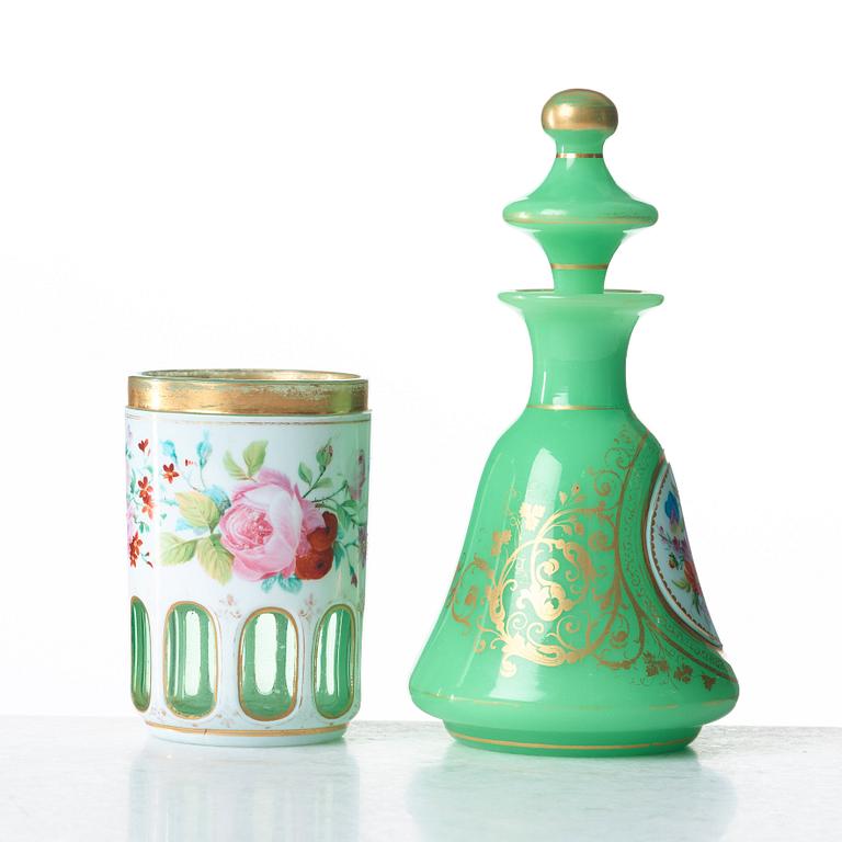 A green bottle with stopper and a beaker glass, Russia, 19th Century.