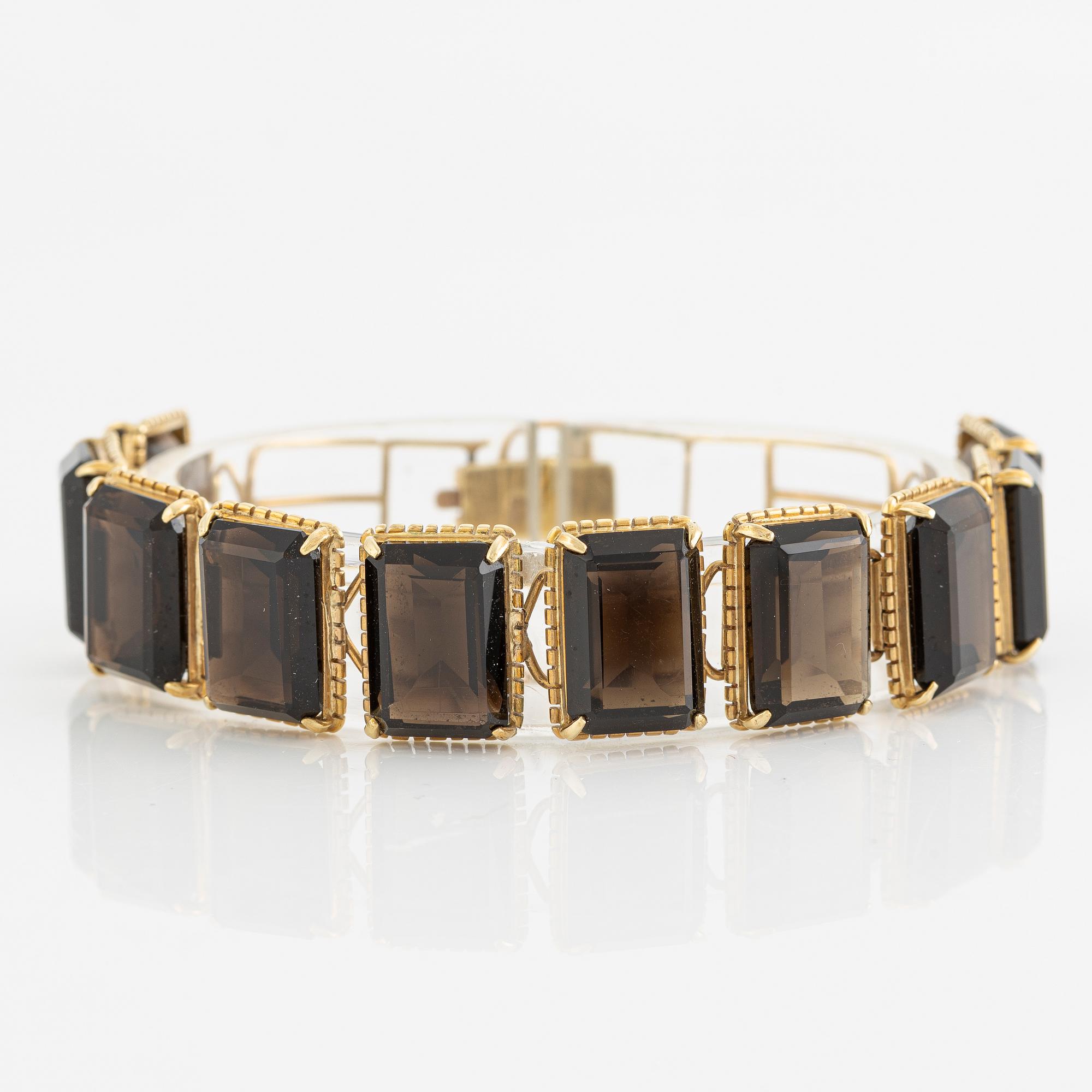 Bracelet, 14K gold with smoky quartz.