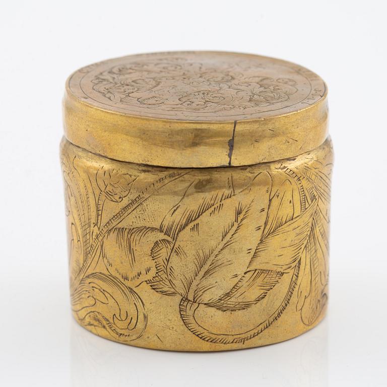 A presumably German baroque brass box, dated 1686.