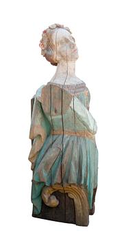 173. A WOODEN FIGURE- HEAD,