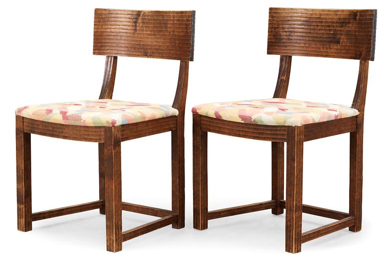 A pair of stained birch chairs, possibly by Axel Einar Hjorth, Sweden 1930-40's.