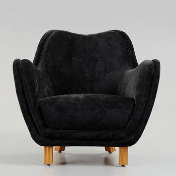 Swedish designer, an upholstered easy chair, 1950's.