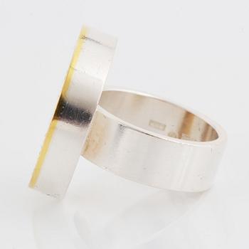 A Hedvig Westermark ring in silver and 18K gold.