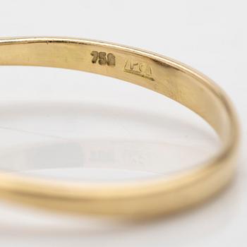 18K gold ring with emerald and diamonds.
