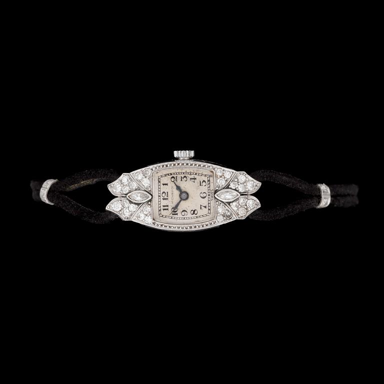 LADIES WATCH, Movado, marquise and round cut diamonds, tot. app. 0.35 cts.