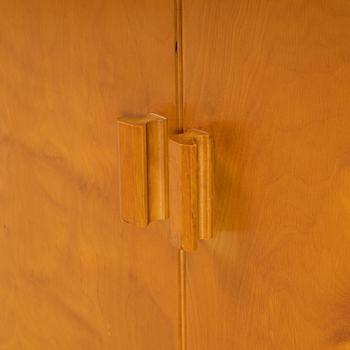 Three birch-veneered cabinets, 1930's/40's.