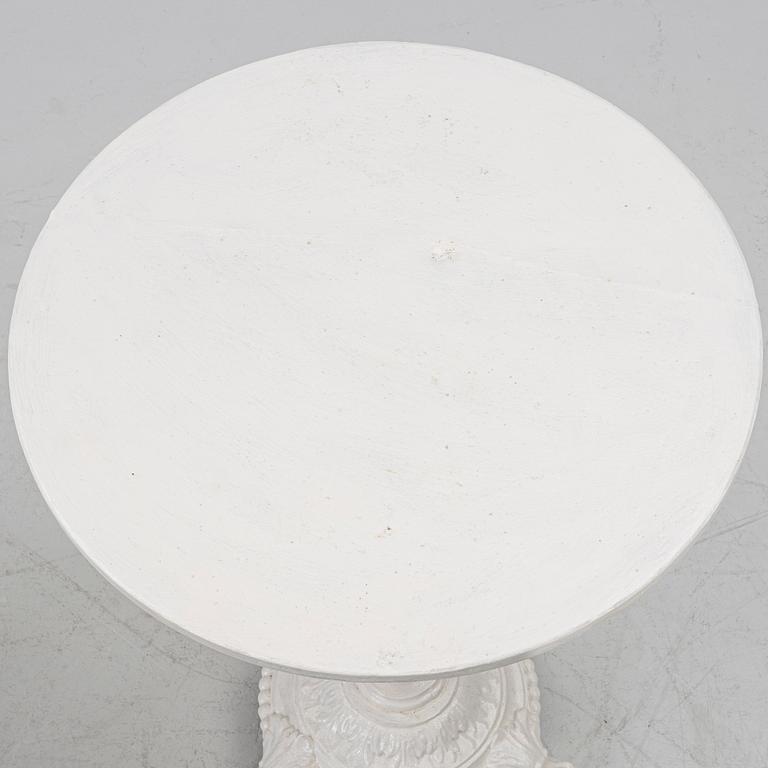 A pair of café tables, around 1900.