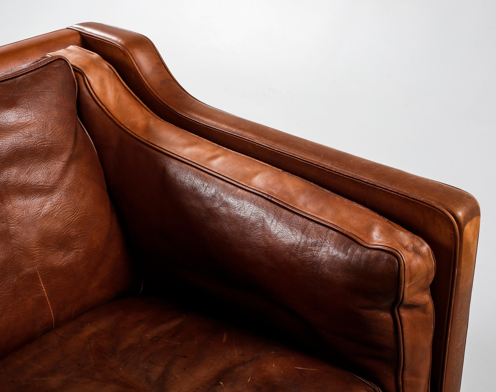 A sofa with model number 2213, designed by Borge Mogensen for Fredricia Stolefabrik.