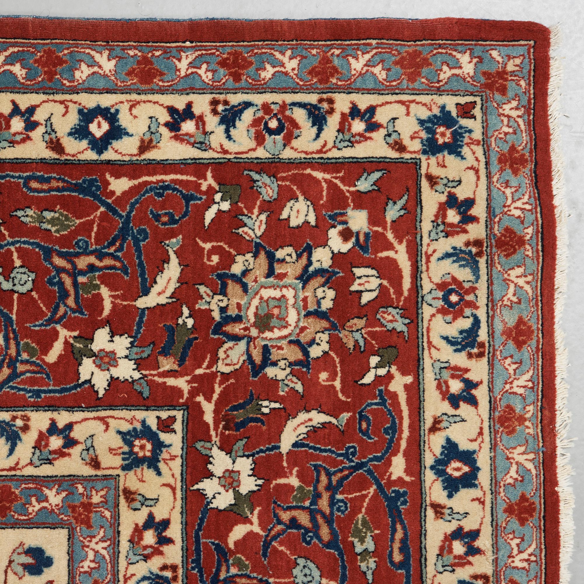 A old Esfahan carpet, around 299 x 210 cm.