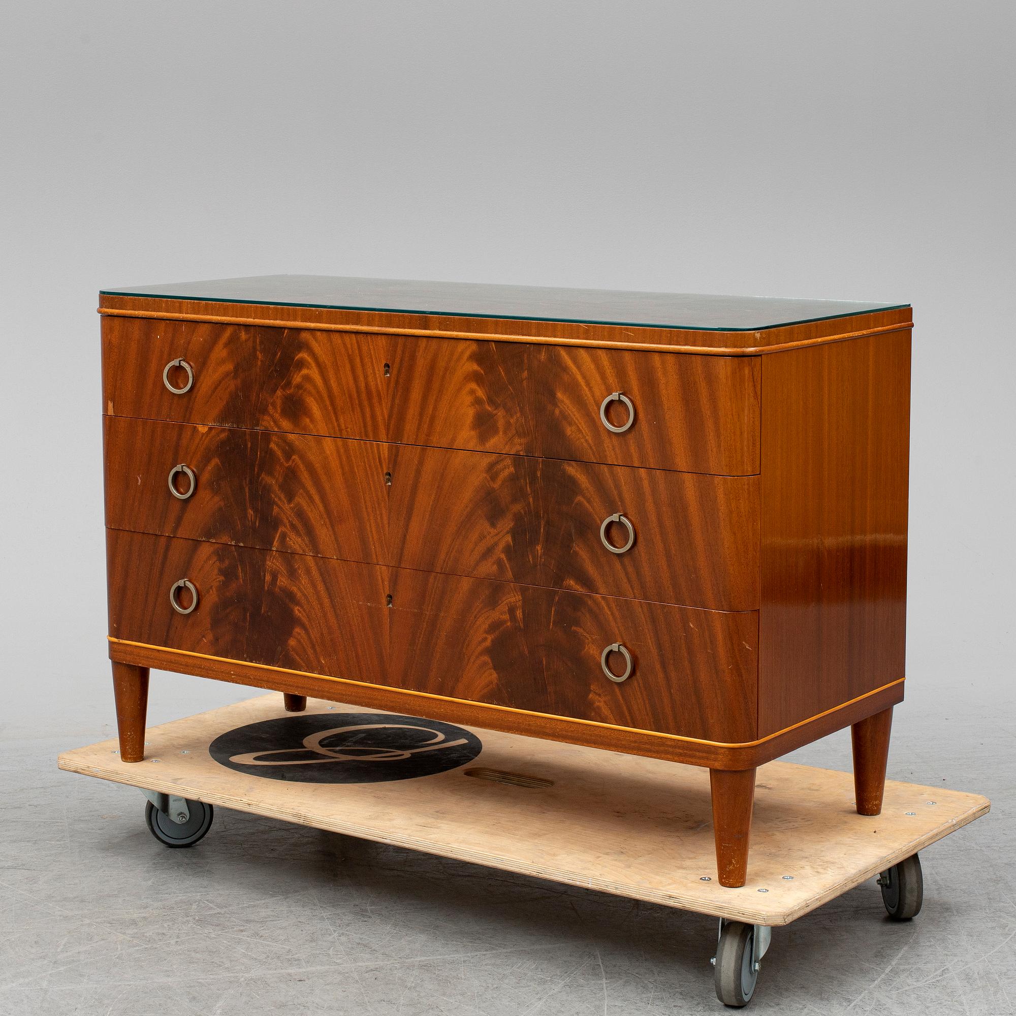 A chest of drawers, mid 20th century.