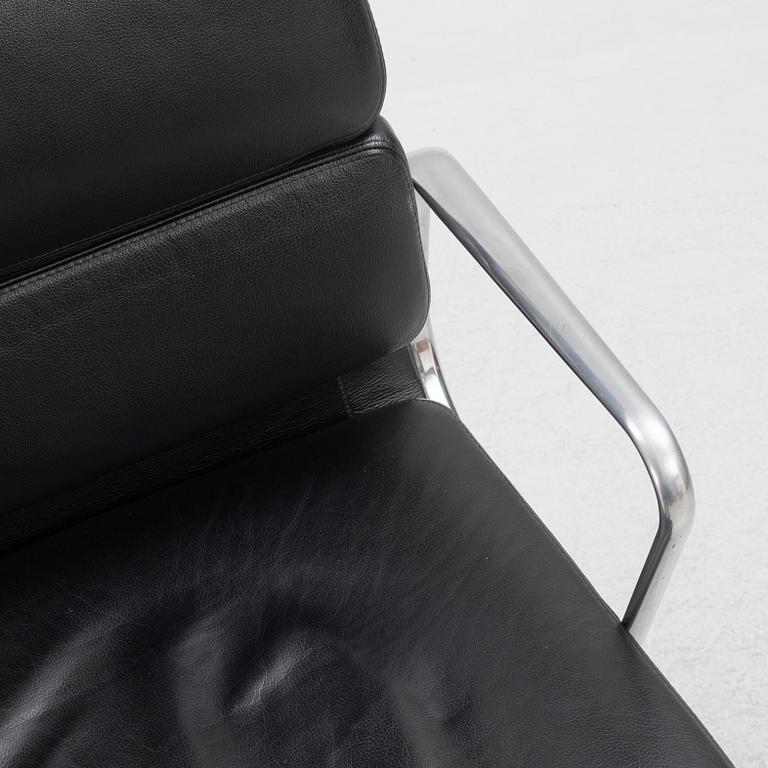 Charles & Ray Eames, a "Soft Pad Chair EA 219" swivel chair, Vitra, 21st century.