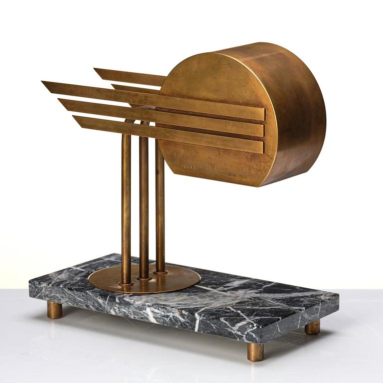 An Austrian brass and black marble table lamp, marked Vienna 1928.