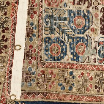 A RUG, an antique Gördes (Ghiordes) prayer rug, second half of the 18th century, ca 167-170 x 120-123 cm.