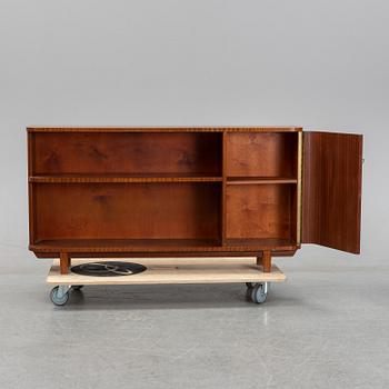 A mahogany veneered bookcase, 1940's/50's.