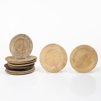 Ten wooden plates, 19th Century.