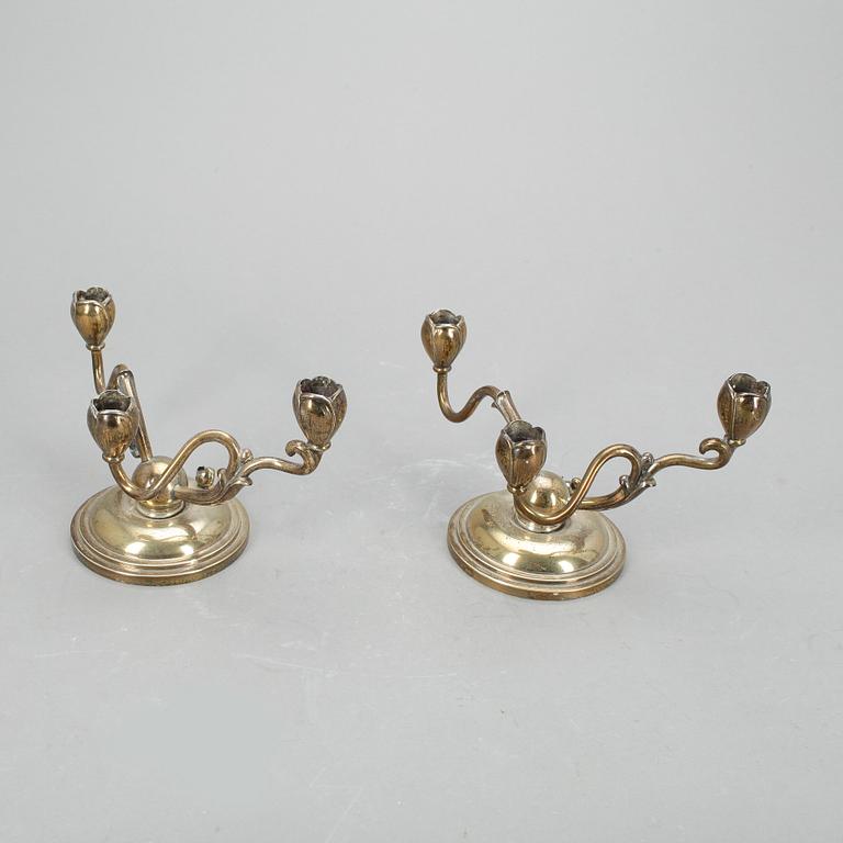 LJUSSTAKAR, ett par, W A Bolin, silver, 1950.