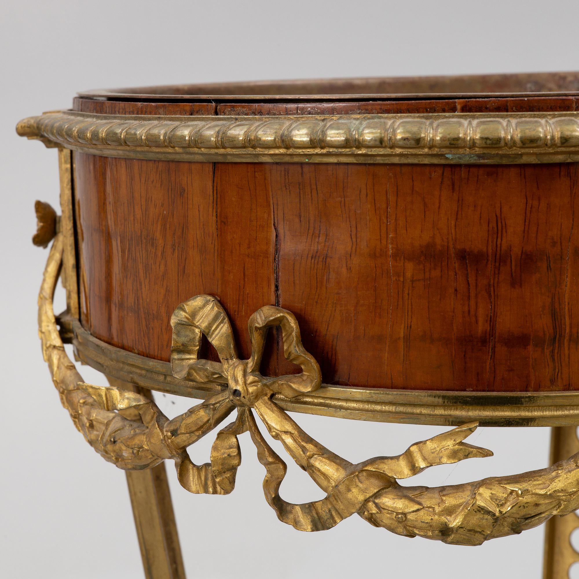 An Empire style flower table, circa 1900.