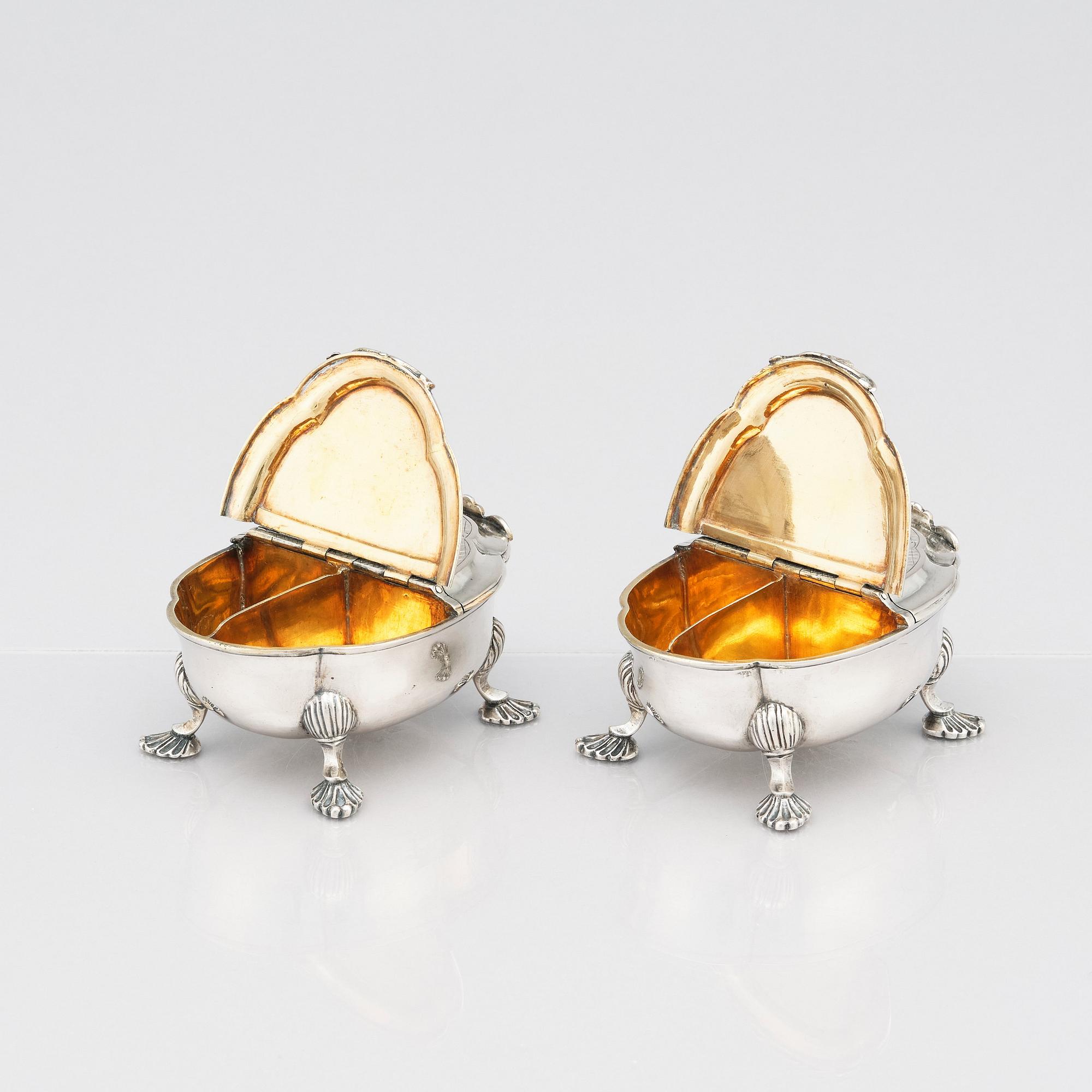 A pair of Latvian Rococo silver salt and pepper stands, marks of Johan Christian Henck (Henke), Riga 1768-80.