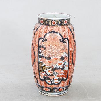 A Japanese porcelain Imari floor urn around  1900.