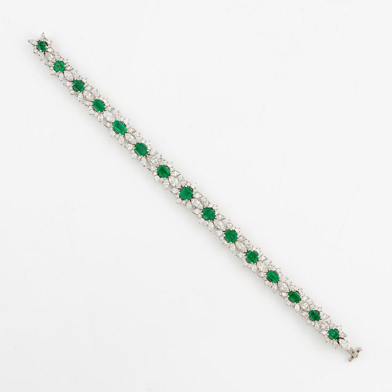 A bracelet in 18K white gold with step-cut emeralds and round and navette-shaped brilliant-cut diamonds.