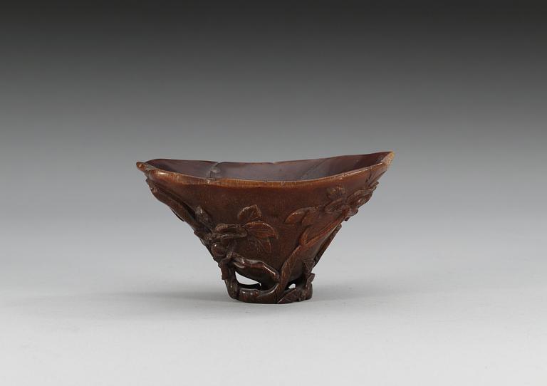 A rhinoceros horn libation cup, Qing dynasty, Kangxi (1662-1722).