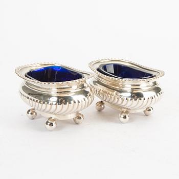 A pair of 20th century silver salters.