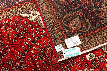 A Tabriz carpet, c 295 x 198 cm.