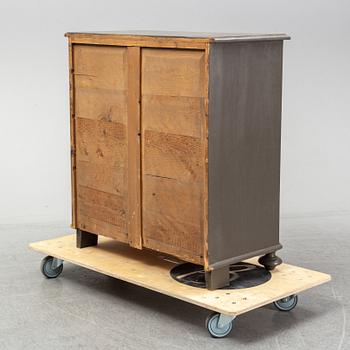 A painted chest of drawers, late 19th Century.