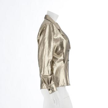 CHRISTIAN DIOR, a goldlamé jacket / shirt. Size 8.