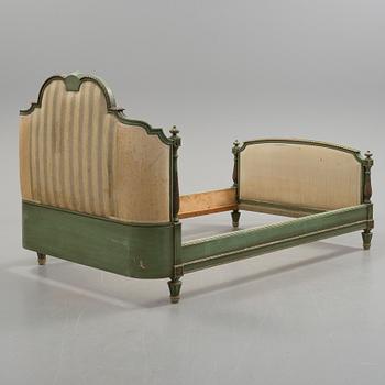 A gustavian style bed, first half of the 20th century.