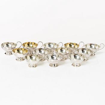 A set of twelve Swedish silver punsch cups, including Ceson, Gothenburg 1989.